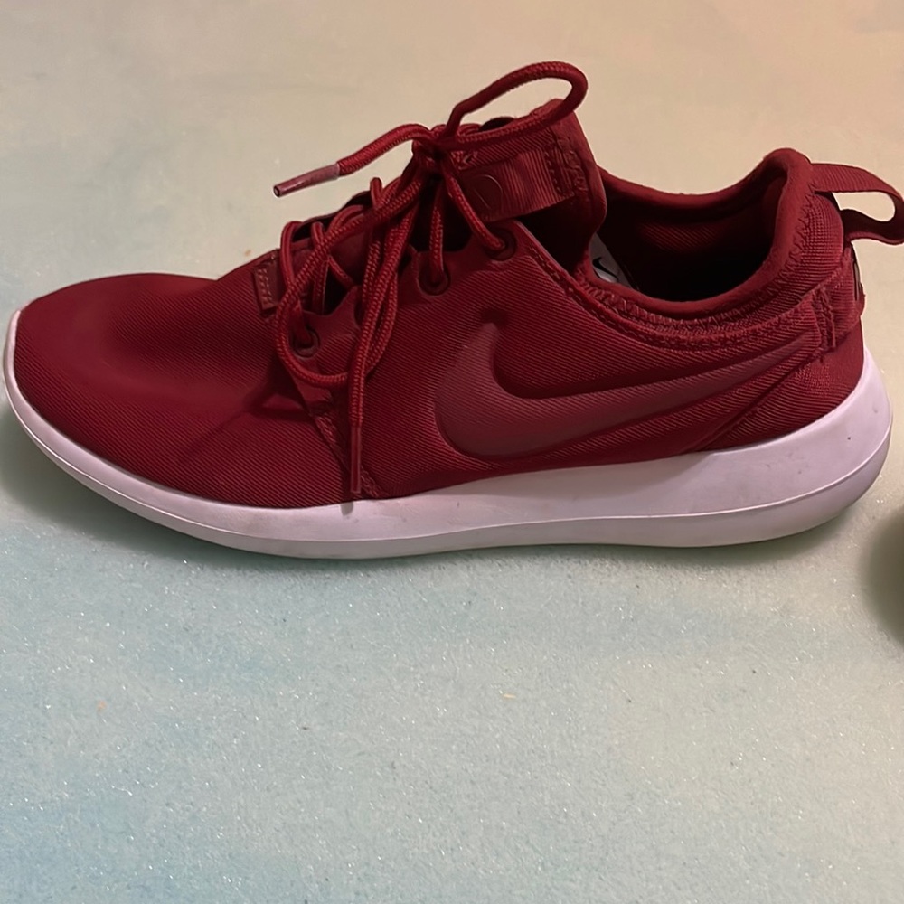 Deep red Nike shoes